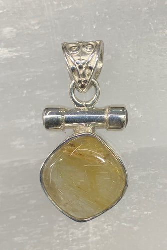 Rutilated Quartz and Garnet Pendant